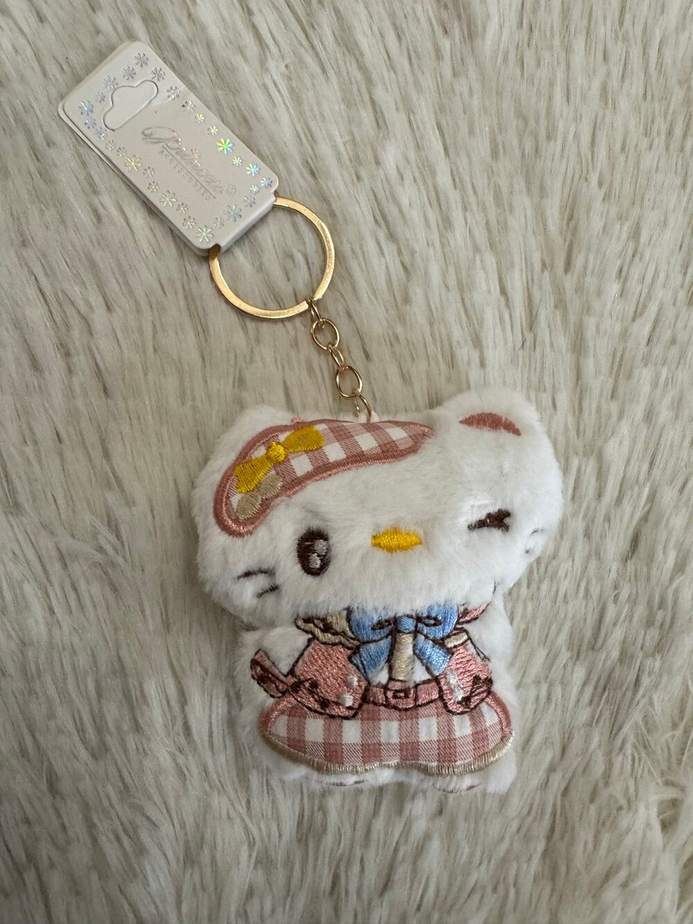 Hello Kitty embroidered keychain with pink white checkered dress and blue bow